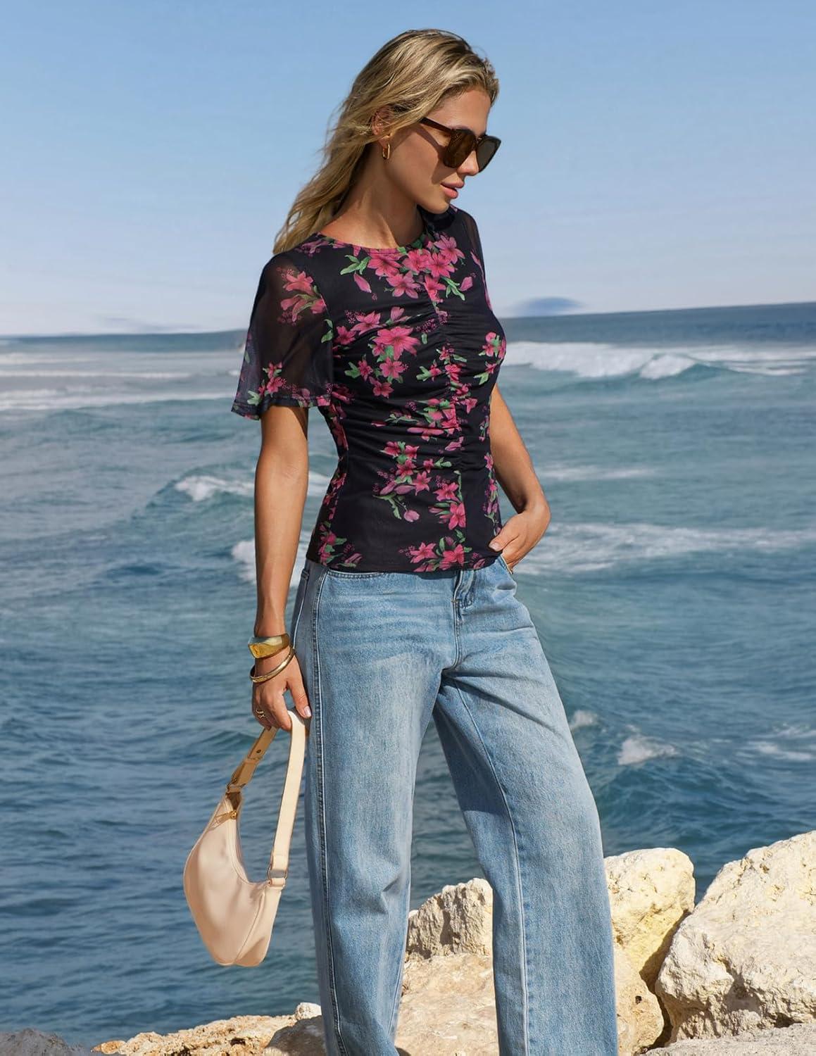 imageMEROKEETY Womens Mesh Floral Tops Summer 2026 Ruched Ruffle Short Sleeve Crew Neck Trendy Going Out BlouseBlack