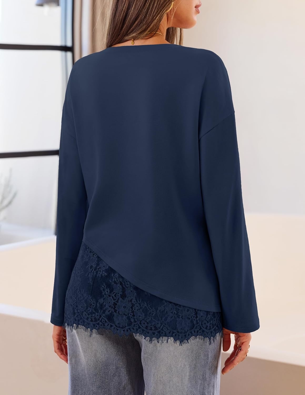 image:imageMEROKEETY Womens Long Sleeve Tops Fall 2026 Lace Patchwork Casual Shirts Elegant Asymmetrical Hem Classic Crew Neck Ribbed Trim Cotton Trendy Fashion Loose Fit Going Out Date Night BlouseNavy