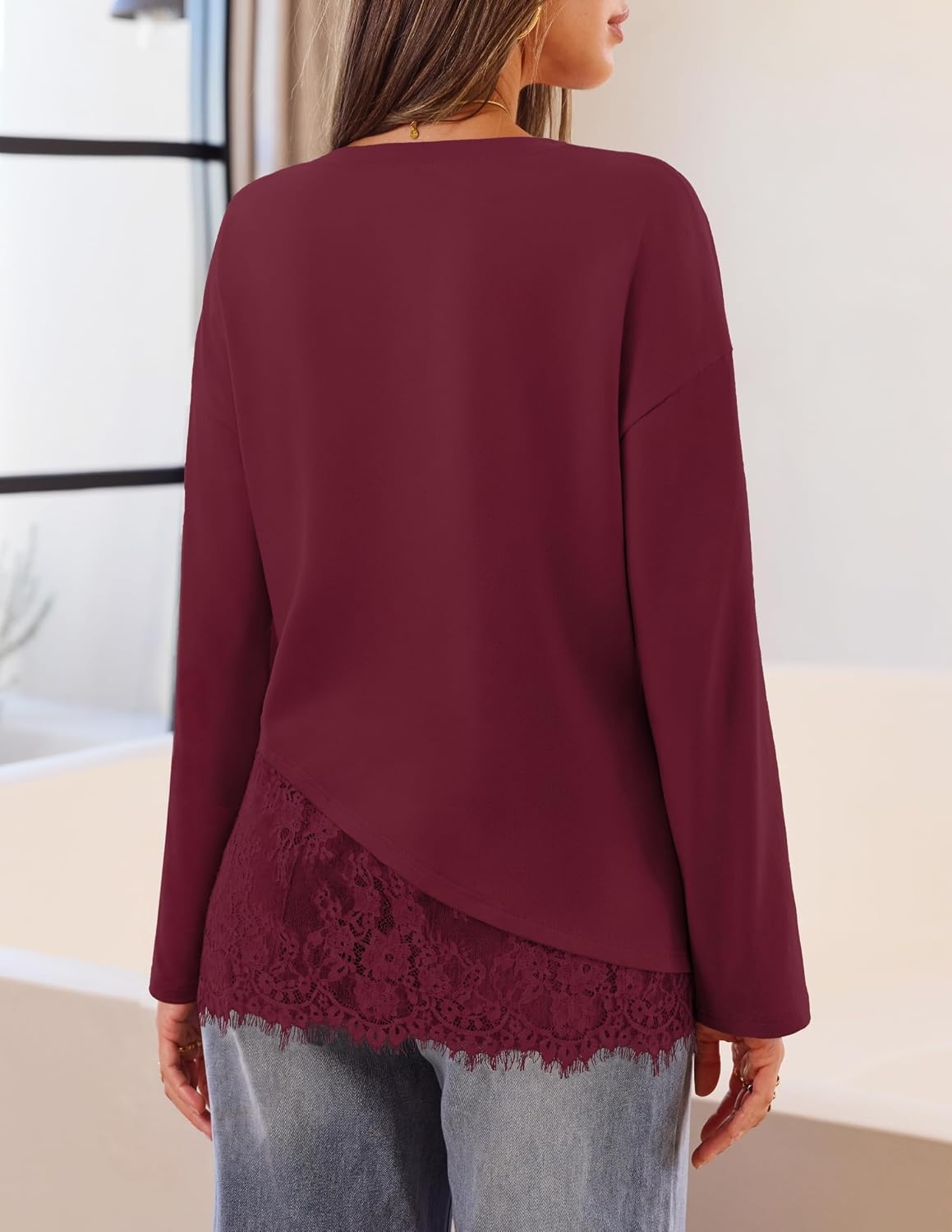 image:imageMEROKEETY Womens Long Sleeve Tops Fall 2026 Lace Patchwork Casual Shirts Elegant Asymmetrical Hem Classic Crew Neck Ribbed Trim Cotton Trendy Fashion Loose Fit Going Out Date Night BlouseBurgundy
