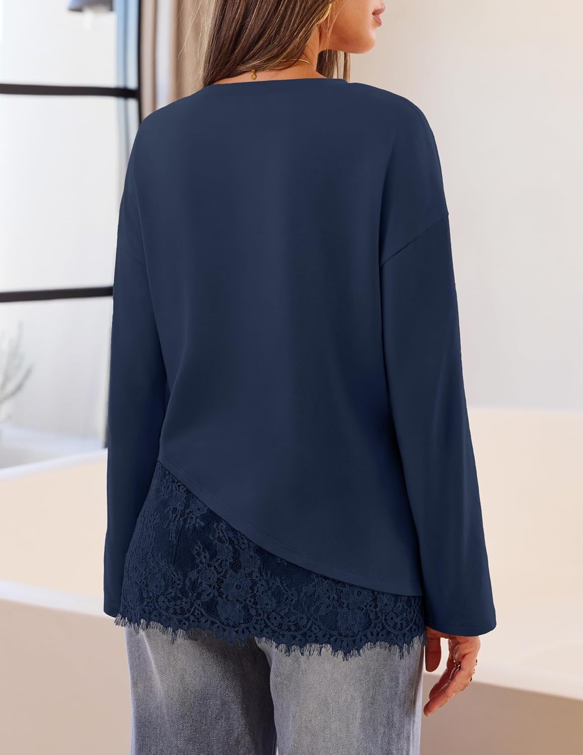 image:imageMEROKEETY Womens Long Sleeve Tops Fall 2026 Lace Patchwork Casual Shirts Elegant Asymmetrical Hem Classic Crew Neck Ribbed Trim Cotton Trendy Fashion Loose Fit Going Out Date Night BlouseNavy