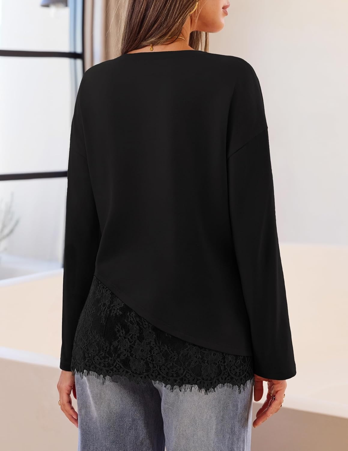 image:imageMEROKEETY Womens Long Sleeve Tops Fall 2026 Lace Patchwork Casual Shirts Elegant Asymmetrical Hem Classic Crew Neck Ribbed Trim Cotton Trendy Fashion Loose Fit Going Out Date Night BlouseBlack