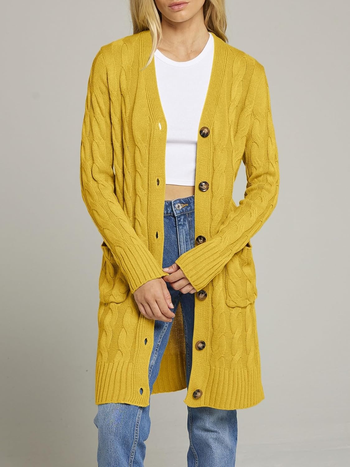 image:imageMEROKEETY Womens Fall Cable Knit Button Long Cardigan Sweater Button Front Long Sleeve Chunky Knit Open Front V Neck Loose Fit Side Pockets 2026 Winter Casual outerwearMustard